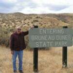 Grandpa with Sand dunes behind him !